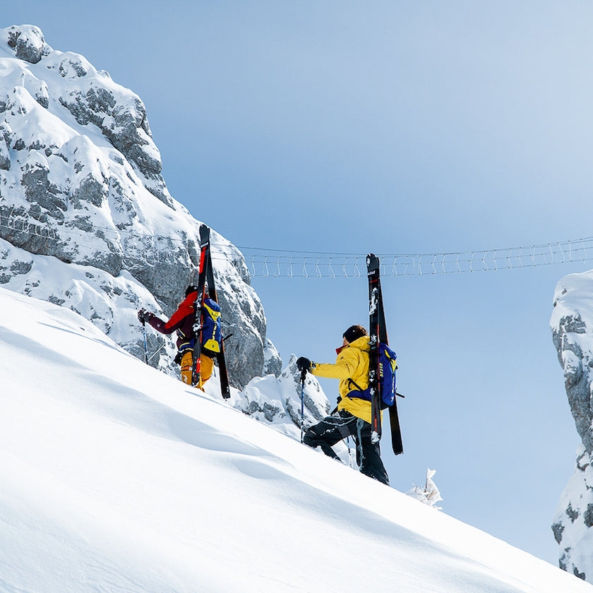 Hagan skiers climbing boot packing to a Via Ferrata